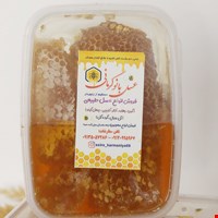 عسل با موم کنار درجه یک
